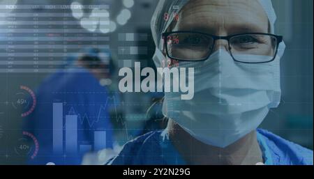 Image of statistics and data processing over caucasian male surgeon Stock Photo