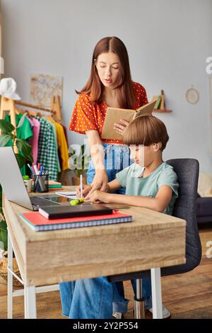 A mother shares moments of joy and discovery with her hearing impaired child. Stock Photo