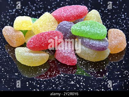 Pile of sugary sweets on black background Stock Photo
