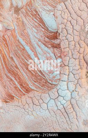 Aerial drone view of surreal, patterned stone textures of White Pocket in Arizona's Paria Canyon-Vermilion Cliffs Wilderness evoke a natural abstract Stock Photo