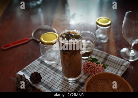 drinking on one of the best traditional drink in indonesia and it is called cendol Stock Photo