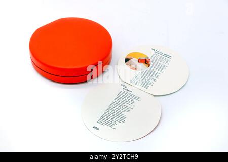 vintage orange Braun Lady 5650 ladyshaver 1971 Electric Razor Shaver Women Hair Remover isolated on white studio background with zip up case Stock Photo