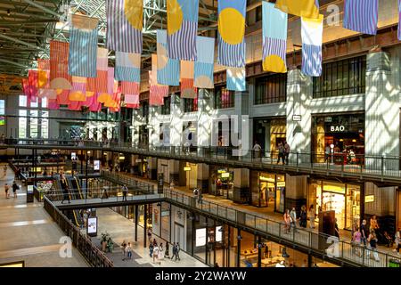 The interior of Turbine Hall A inside Battersea Power Station, a former coal fired power station now a prime leisure destination in Nine Elms, London Stock Photo