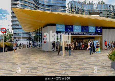 People at the entrance to Battersea Power Station tube station on the Northern Line, the terminus of the Northern line extension to Battersea, London Stock Photo