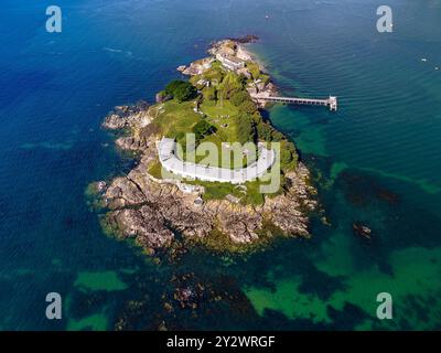 An aerial view of Drake's Island lying in Plymouth Sound, in Plymouth city on a sunny day, Devon, England, UK Stock Photo