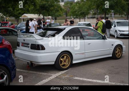 Rear view of a classic tuned Japanese sports car, the sixth generation Honda Civic EJ9 1996 2000 EK in white. Stock Photo