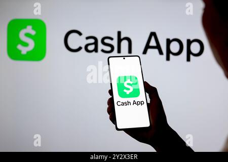 September 11, 2024, Paraguay. In this photo illustration, the Cash App logo is displayed on a smartphone and in the background (Photo by /Sipa USA) *** Strictly for editorial news purposes only *** Credit: Sipa USA/Alamy Live News Stock Photo