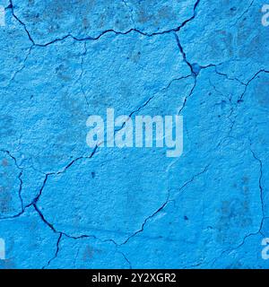 square part of blue painted conrete with abstract line pattern formed by cracks Stock Photo