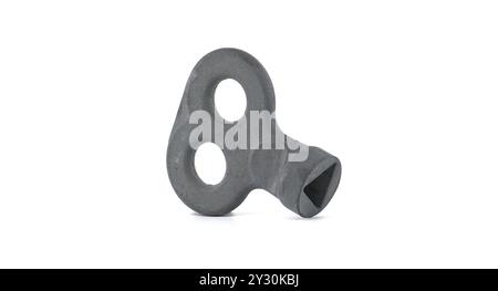 A vintage metal clock key with a two-hole design, isolated on a white background, symbolizing timekeeping and tradition. Stock Photo