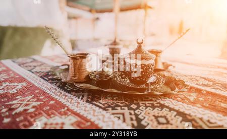 Traditional Turkish Coffee Setup on a Colorful Rug Stock Photo