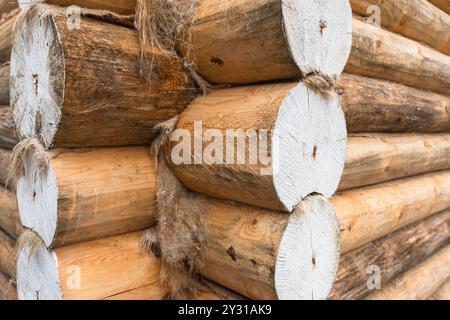 Exterior details of rural wooden house made of logs, close up photo Stock Photo