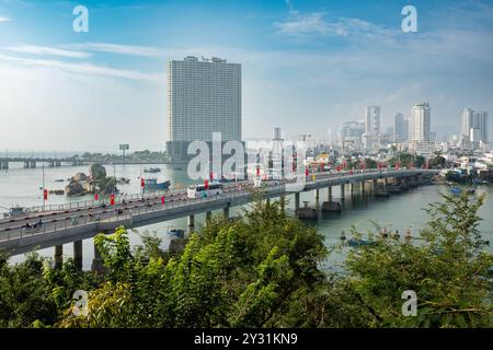 Bridges over the River Cai, which flows into the South China Sea. View over Nha Trang city and river Kai from Po Nagar cham towers, Vietnam. Ships and Stock Photo