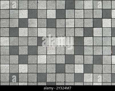 Natural black grey and white paving stone tiles in Checkerboard square pattern. seamless texture Stock Photo