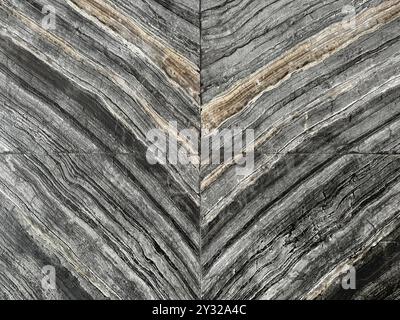 Black forest Italian marble texture in book matched or open book marble. This type of marble is famous for its lavish-look finishing and black flows Stock Photo