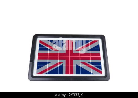 Portable solar panel in the shape of the flag of Great Britain isolated on white background (close-up) Stock Photo