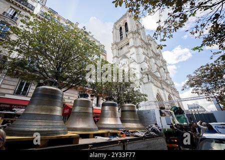Eight bells return to the north belfry of Notre-Dame de Paris cathedral, central Paris, France on September 12, 2024. From "Gabriel", weighing over four tonnes, to the smaller "Jean-Marie", named in tribute to Cardinal Lustiger: on September 12, Notre-Dame de Paris welcomes back the eight bells in its northern belfry, less than three months before the cathedral reopens. These eight bells, bearing the names of personalities who have marked the life of the diocese and the Church, were removed in July 2023 to allow the restoration of the north tower, which was affected by the flames of the giant Stock Photo