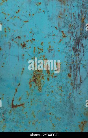 Painted in blue metal rusted background. Erosion metal. Metal rust texture. Stock Photo