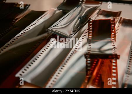 Cut strips of photographic color film. Close-up of color negatives. Stock Photo