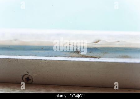 old sealant on window glass close up Stock Photo