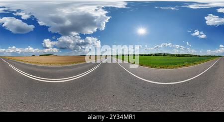 spherical 360 hdri panorama on old asphalt road with clouds and sun on blue sky in equirectangular seamless projection, as skydome replacement in dron Stock Photo
