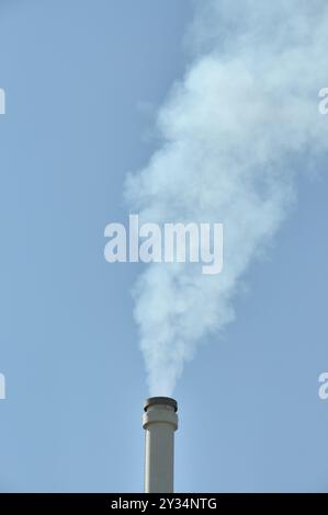 smoking chimneys of a lignite power plant at night Stock Photo - Alamy