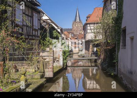 Lauter-Viertel le Schlupf with the tower of the church of St Peter and Paul, Wissembourg, Alsace, France, Europe Stock Photo