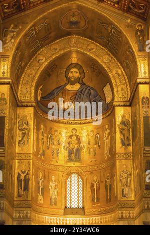 2018.Christ Pantocrator central apse in gold in the Santa Maria Nuova cathedral in the city of Monreale in the north west of Sicily Stock Photo