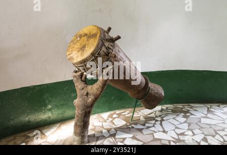 Original African djembe drum with leather blade lay on a treadmill forming a trunk in Gambia Stock Photo