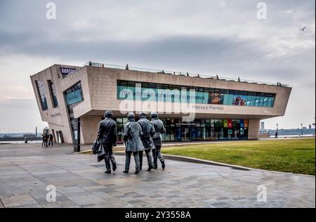 This image is the statue of the Liverpool music group the Beatles who established themselves as one of the worlds most famous rock bands in the 1960's Stock Photo