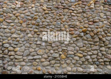 A scenic view of a natural old stone wall Stock Photo