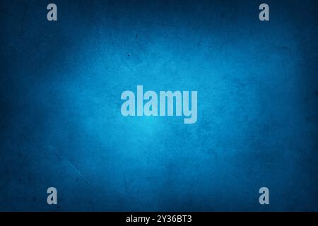 Blue textured concrete wall background. Dark edges Stock Photo