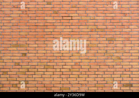 Background from a wall made of orange clinker bricks Stock Photo