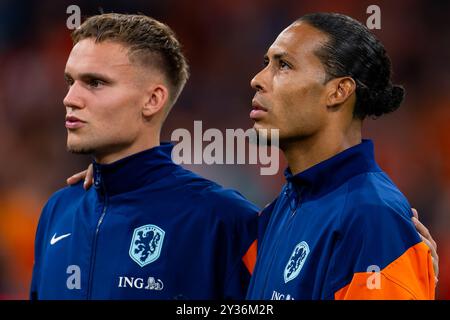 Amsterdam, Netherlands. 10th Sep, 2024. AMSTERDAM, NETHERLANDS - SEPTEMBER 10: Goalkeeper Bart Verbruggen of the Netherlands and Virgil van Dijk of the Netherlands prior to the UEFA Nations League 2024/25 League A Group A3 match between Netherlands and Germany at Johan Cruijff Arena on September 10, 2024 in Amsterdam, Netherlands. (Photo by Joris Verwijst/BSR Agency) Credit: BSR Agency/Alamy Live News Stock Photo