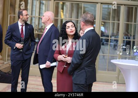 Potsdam, Brandenburg, Germany. 12th Sep, 2024. Brandenburg: The photo shows the President of the Republic of Kosovo, Dr. Vjosa Osmani-Sadriu before the M100 Media Award ceremony in the Orangery Sanssouci in Potsdam (Credit Image: © Simone Kuhlmey/Pacific Press via ZUMA Press Wire) EDITORIAL USAGE ONLY! Not for Commercial USAGE! Stock Photo