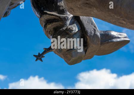 See closeup sculpture of Buffalo Bill Cody cowboy boot, spur, stirrup all part of a bronze statue, The Scout, by Whitney, in Cody, Wyoming, USA. Stock Photo