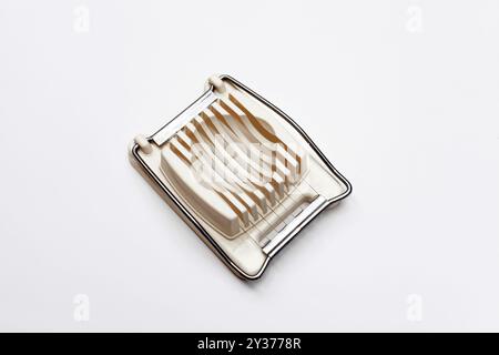 Egg Slicer kitchen utensil on white background Stock Photo