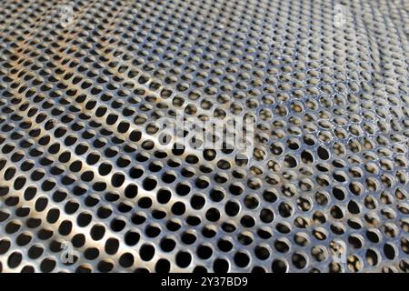Close up textured background of metal grating Stock Photo