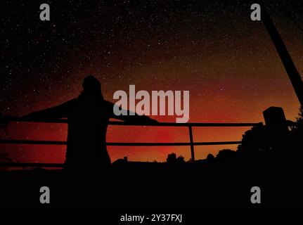 Doddiscombsleigh, Devon, UK. 13th Sep, 2024. Northern lights in the night sky over Doddiscombsleigh, Devon, UK. Aurora Borealis. Credit: nidpor/Alamy Live News Stock Photo