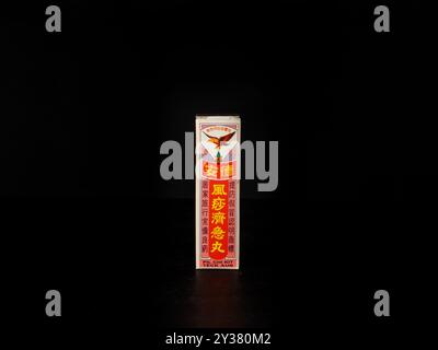Traditional Herbal Medicine Box on Black Background Stock Photo