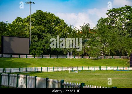 Guwahati Judges Field Cricket Gallery with green lawn grass and LED Stock Photo