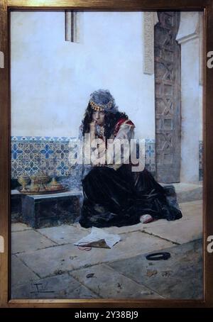 The Letter / La Carta (c.1885) by Antonio Fabrés (1854–1938).Depicting a pensive woman sitting with a note on the floor. Stock Photo