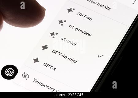 Mobile screen displaying various GPT models with finger interaction. Stafford, United Kingdom, August 13, 2024 Stock Photo