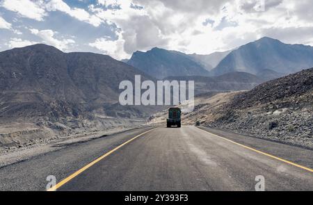 Turck driving on the Karakorum Highway in Pakistan Stock Photo