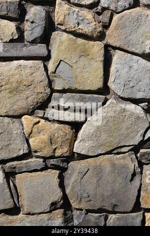 sandstone stone wall with concrete mortar Stock Photo