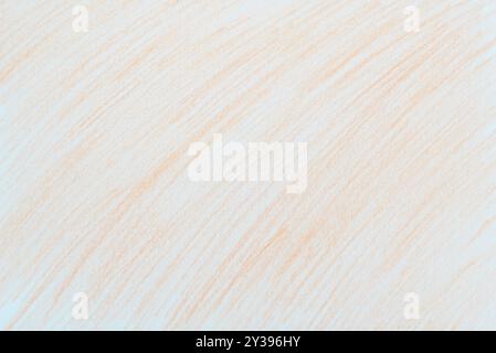 Orange pencil diagonal hatching on white paper background. Hand drawn abstract pattern. Stock Photo
