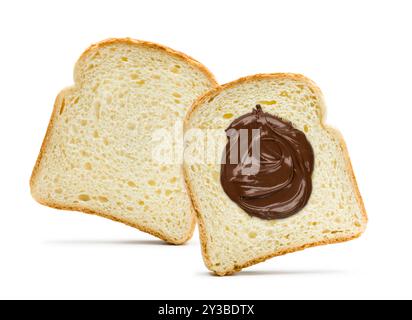 Slices of white bread with chocolate cream spread on white background. Stock Photo