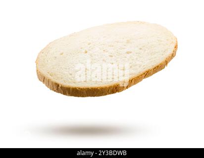Slice of white bread flying on white background. Stock Photo