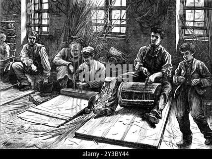 Blind basket-makers, 1871. 'Basket-making is poor work, and it is worthy of consideration whether the blind persons [here] represented at this task, could not be taught some more profitable industry...There are 30,000 blind persons in Great Britain, and it is feared that many of them...are left to pass their lives in a helpless condition, and to suffer poverty and neglect in after years. The trades chiefly practised by the blind in this country are that of basket-making aforesaid, the making of brushes and brooms, of rugs, mats, and mattresses, and the plaiting of cane bottoms for chairs, with Stock Photo