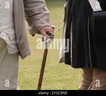 Rope is burning to provide fire to light the fuse which will fire an historicial canon at Tryon Palace in New Bern,North Carolina Stock Photo