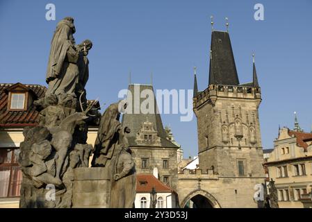 St John of Matha, St Felix of Valois and St Ivan and the bridge towers of Lesser Town on Charles Bridge, Prague Stock Photo